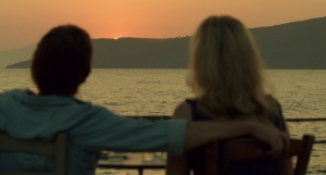 The beautiful Greek sunset, backed by the couple's words "Going, going, gone" beautifully foreshadows their coming conflict, and possible end to a beautiful relationship. 